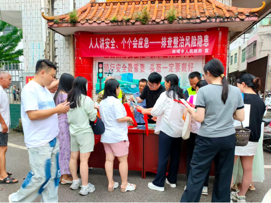 西瑶乡：宣传进集市知识“袋”回家